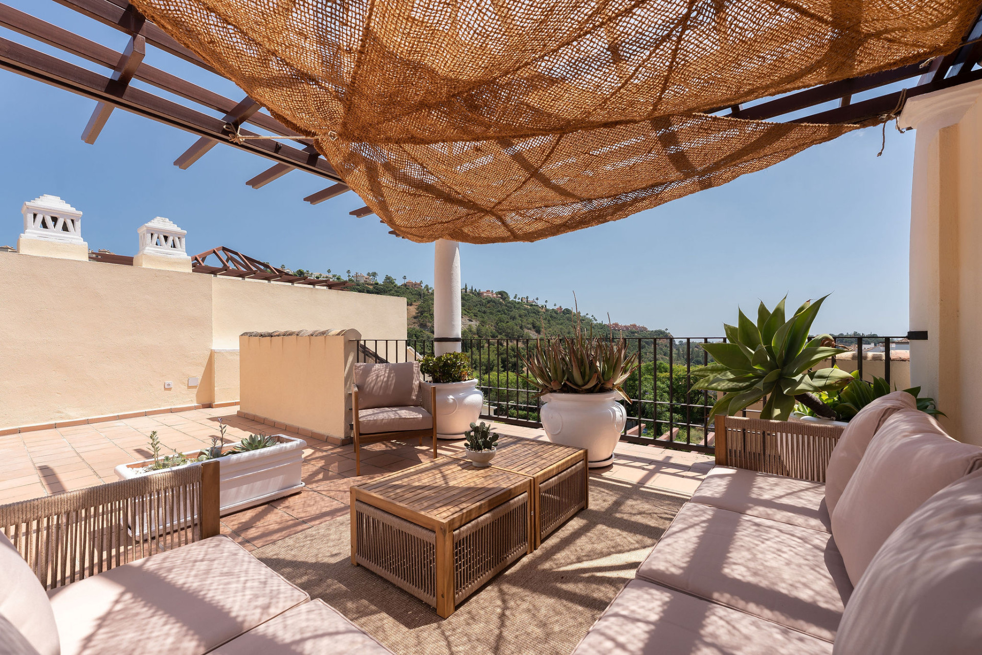 Welcome to this beautifully renovated penthouse offering bright, contemporary living in a tranquil Andalusian urbanization! · Photo 29