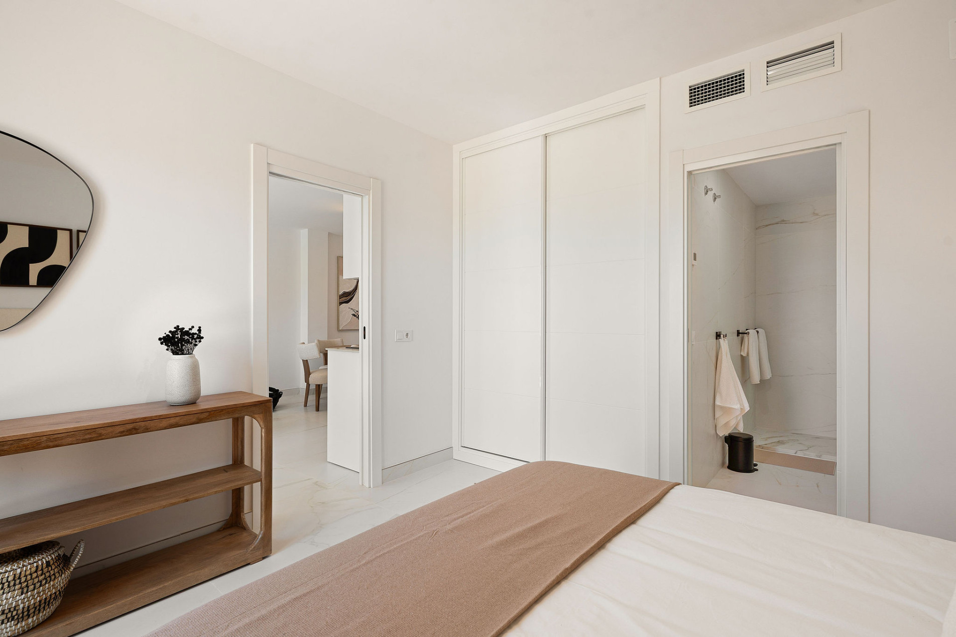 Welcome to this beautifully renovated penthouse offering bright, contemporary living in a tranquil Andalusian urbanization! · Photo 11