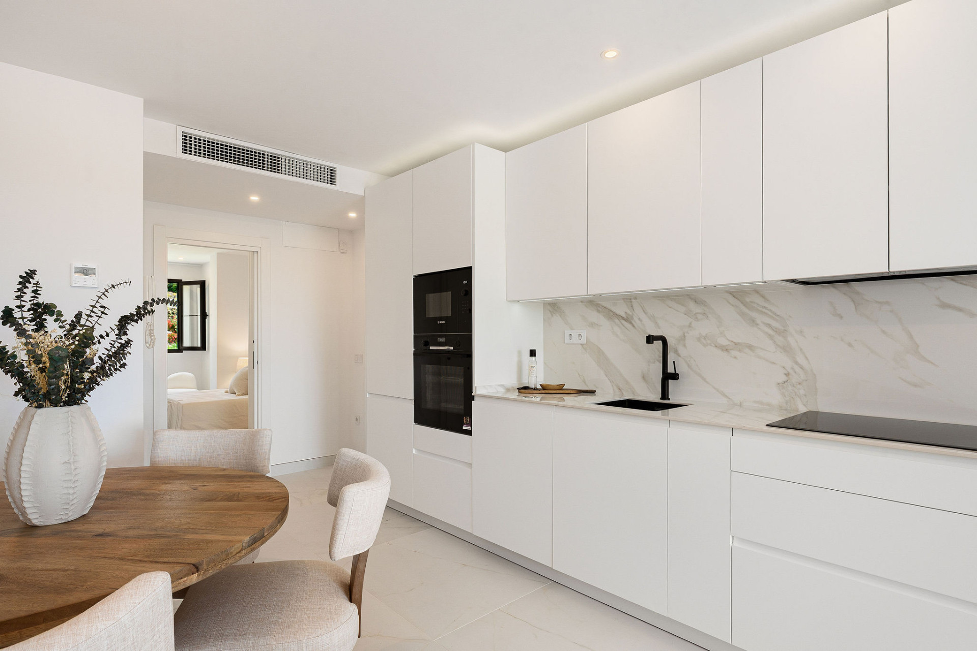 Welcome to this beautifully renovated penthouse offering bright, contemporary living in a tranquil Andalusian urbanization! · Photo 8
