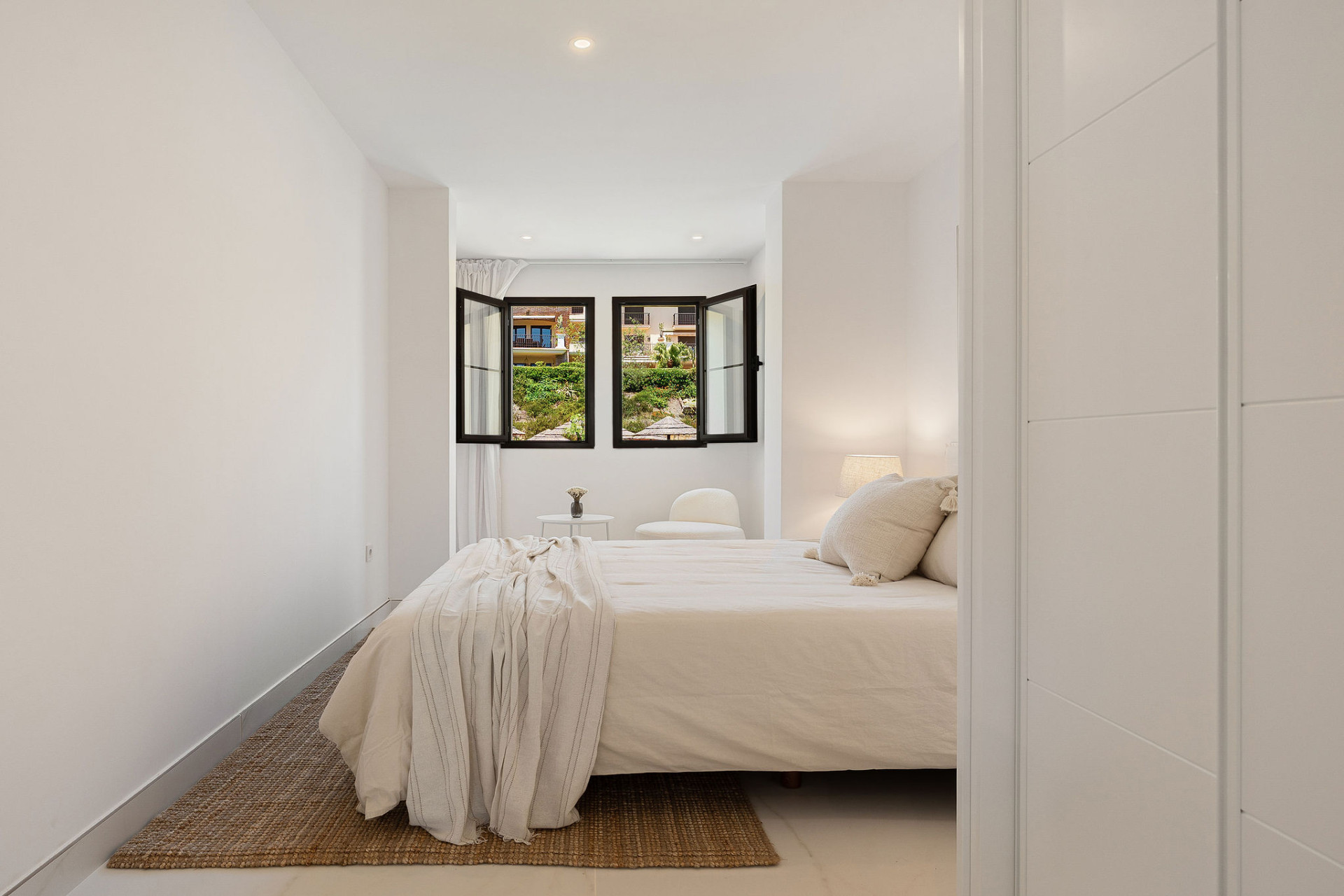 Welcome to this beautifully renovated penthouse offering bright, contemporary living in a tranquil Andalusian urbanization! · Photo 17