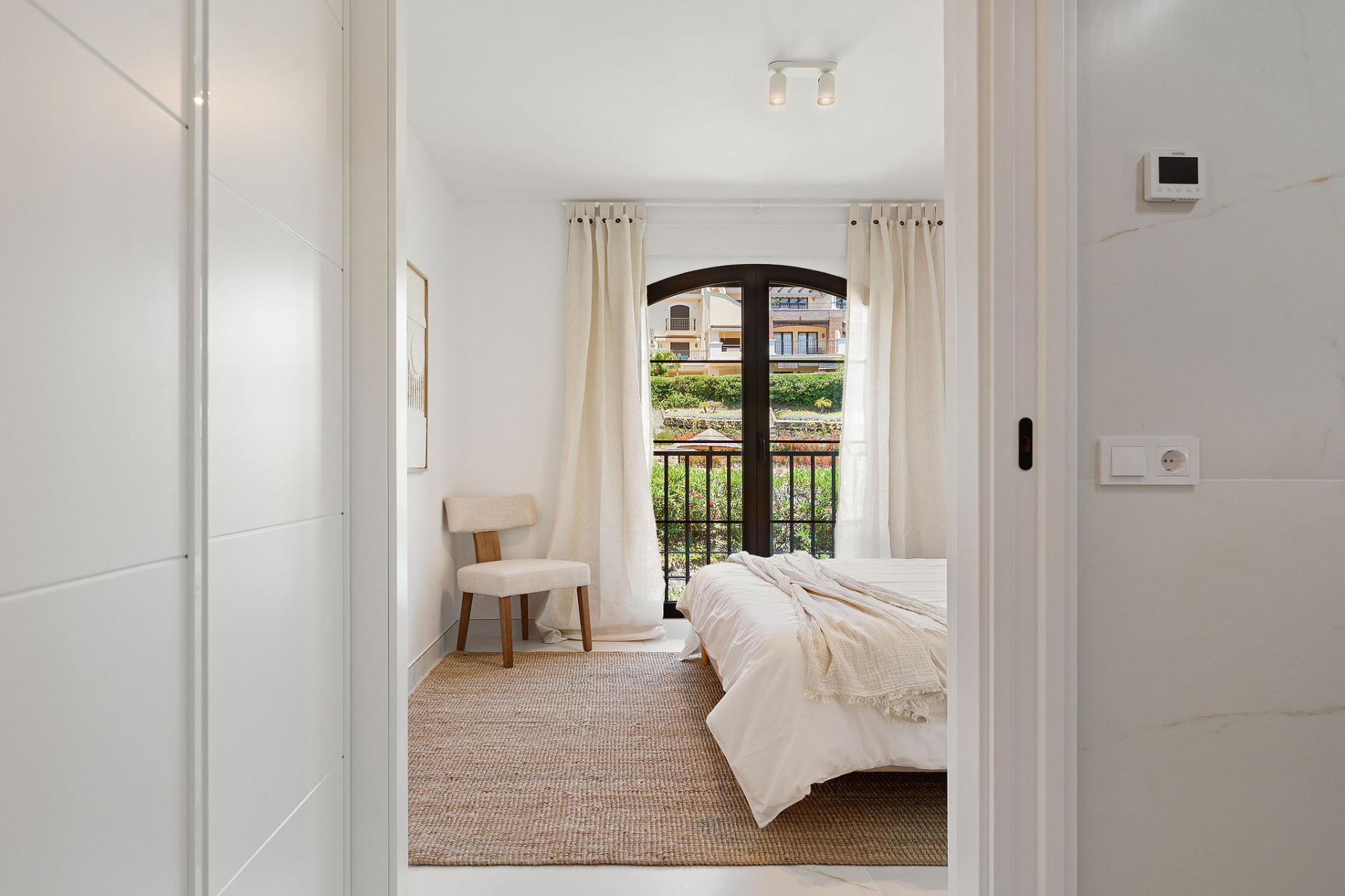 Welcome to this beautifully renovated penthouse offering bright, contemporary living in a tranquil Andalusian urbanization! · Photo 14