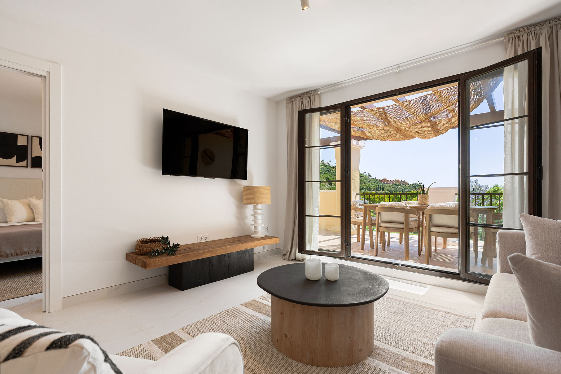 Welcome to this beautifully renovated penthouse offering bright, contemporary living in a tranquil Andalusian urbanization! · Photo 21