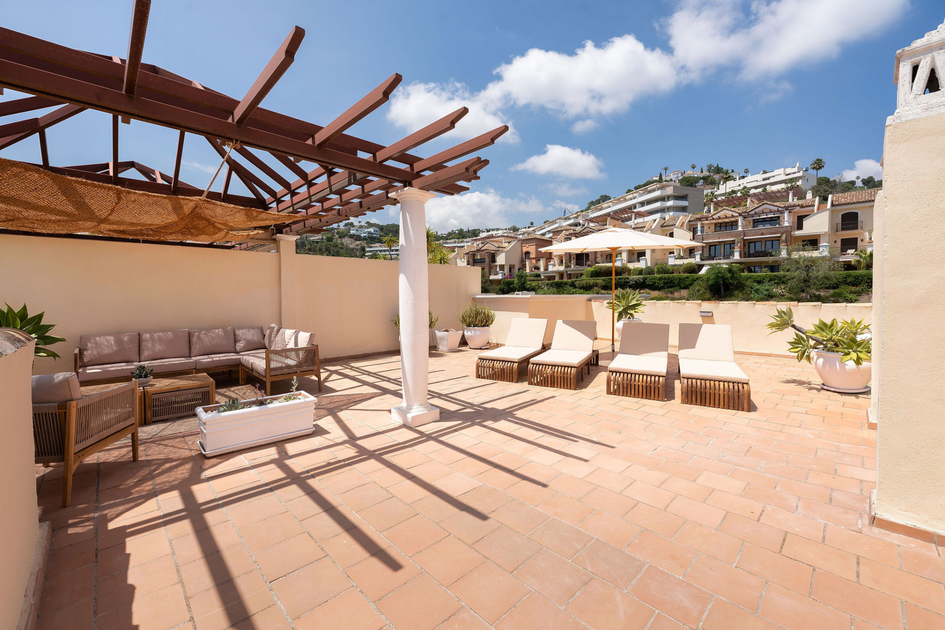 Welcome to this beautifully renovated penthouse offering bright, contemporary living in a tranquil Andalusian urbanization! · Photo 33