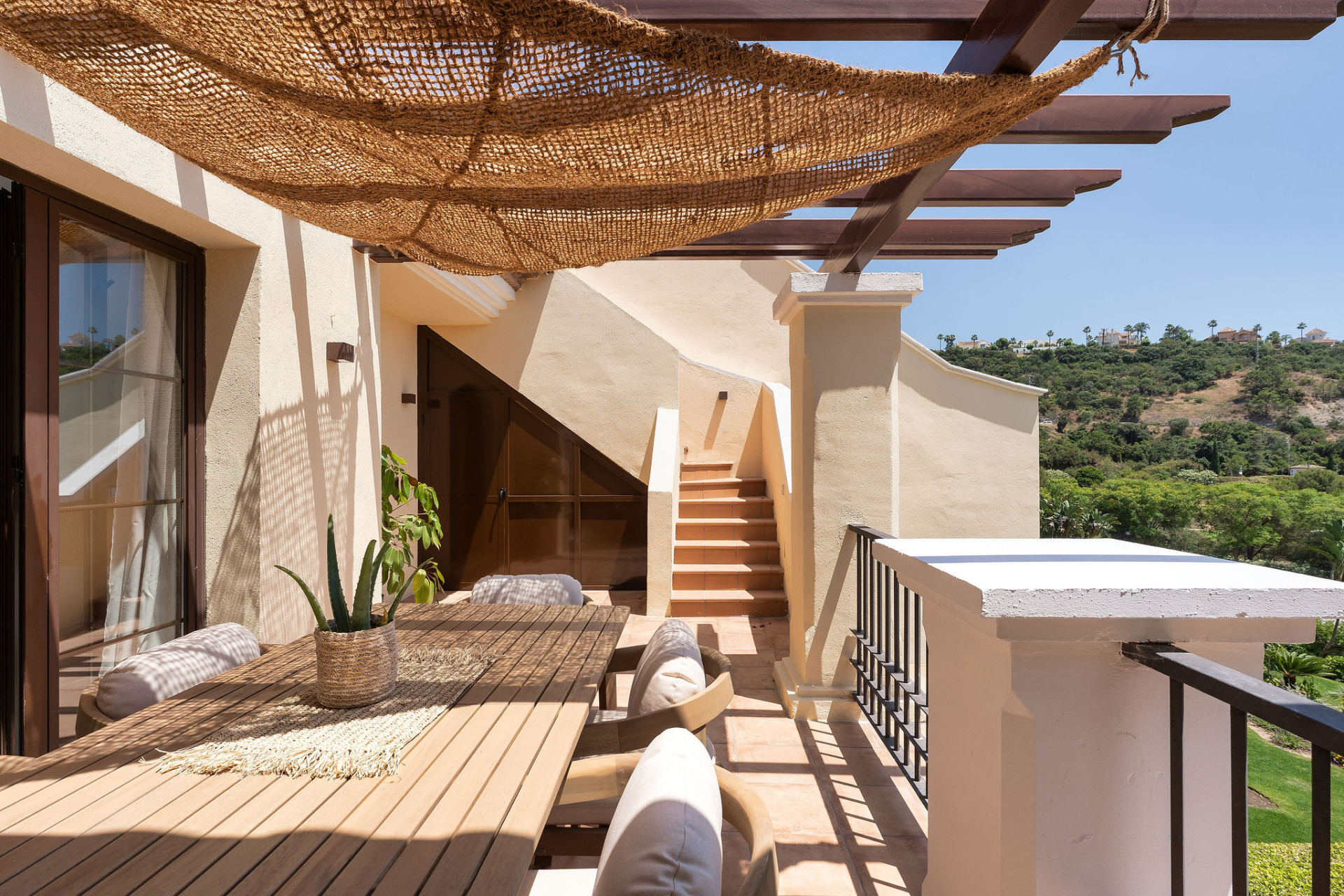 Welcome to this beautifully renovated penthouse offering bright, contemporary living in a tranquil Andalusian urbanization! · Photo 24