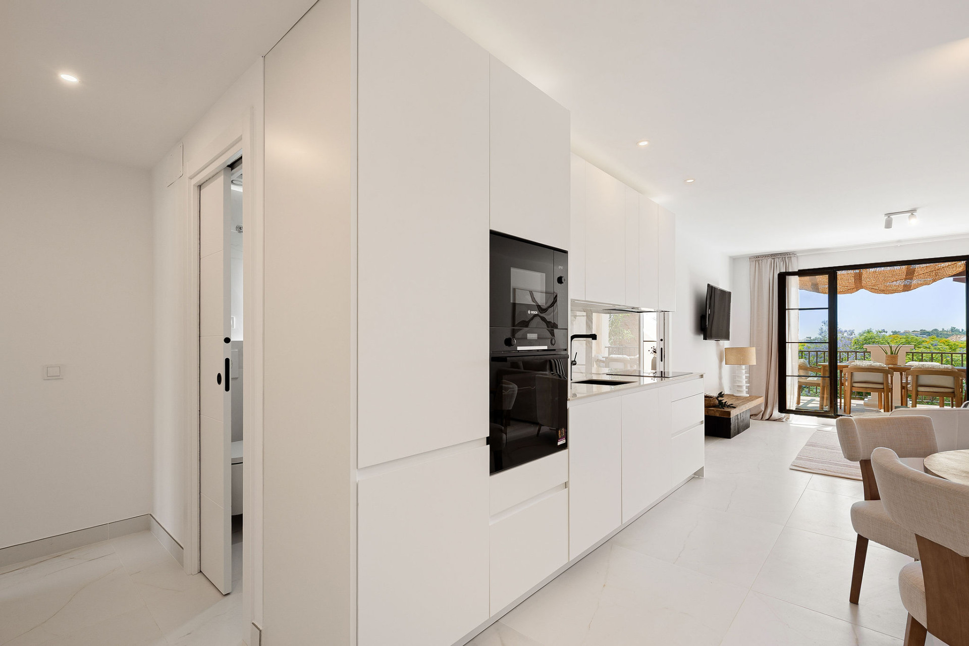 Welcome to this beautifully renovated penthouse offering bright, contemporary living in a tranquil Andalusian urbanization! · Photo 19