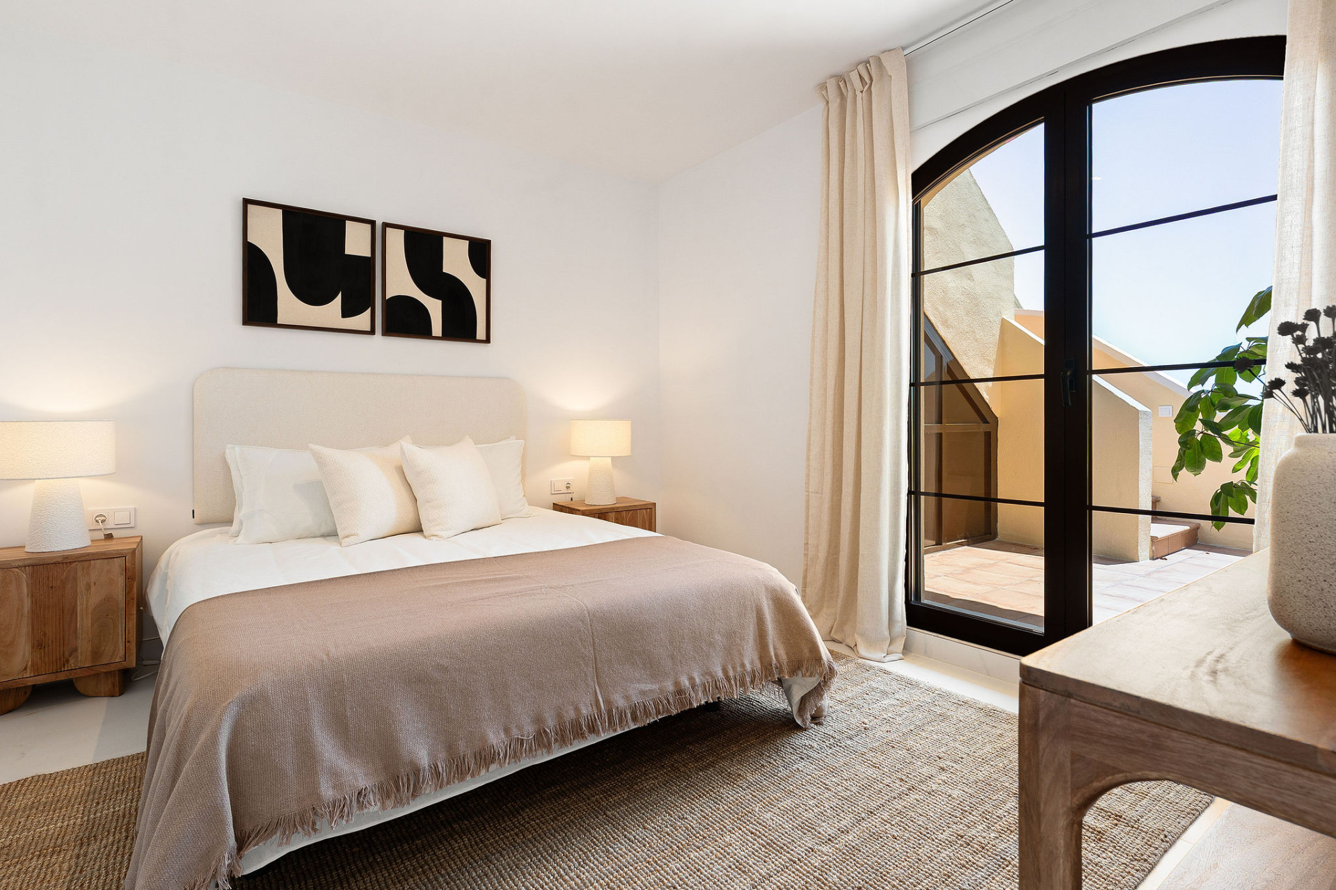 Welcome to this beautifully renovated penthouse offering bright, contemporary living in a tranquil Andalusian urbanization! · Photo 10