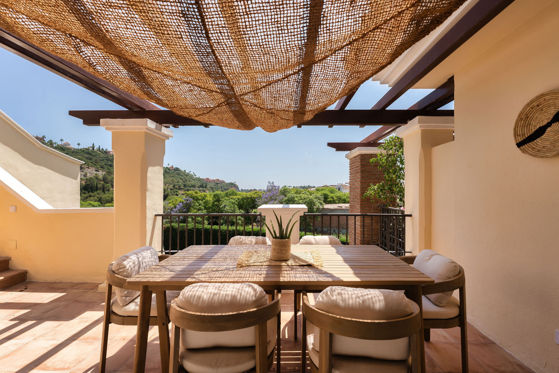 Welcome to this beautifully renovated penthouse offering bright, contemporary living in a tranquil Andalusian urbanization! · Photo 22