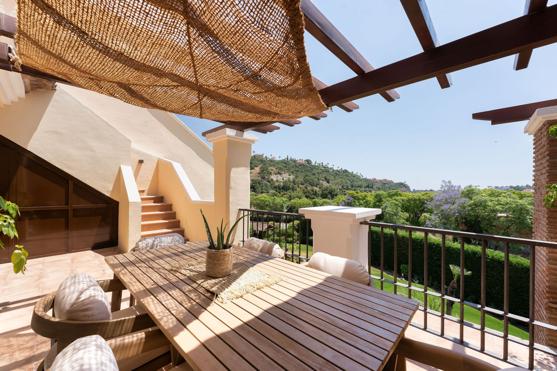 Welcome to this beautifully renovated penthouse offering bright, contemporary living in a tranquil Andalusian urbanization! · Photo 23