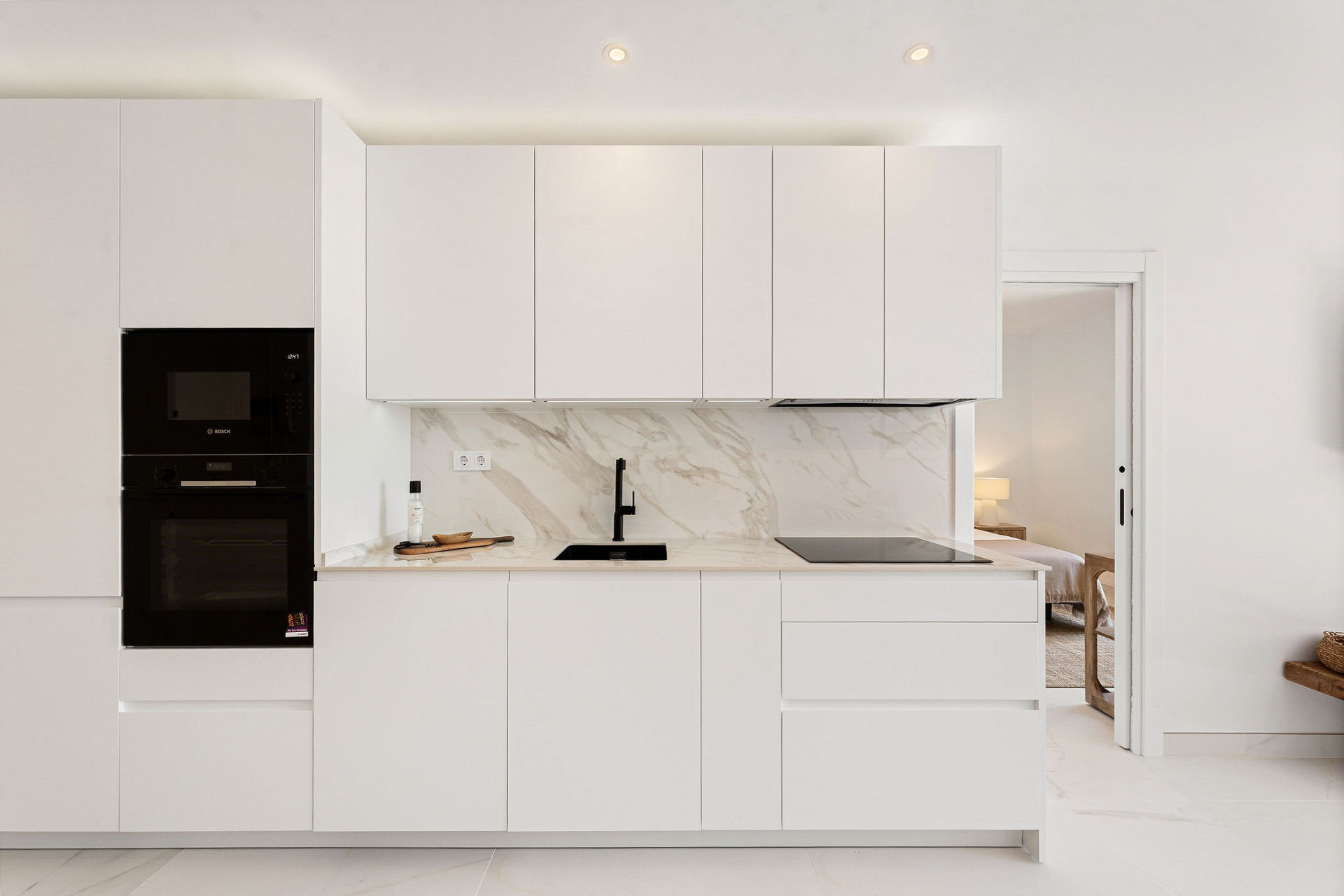 Welcome to this beautifully renovated penthouse offering bright, contemporary living in a tranquil Andalusian urbanization! · Photo 9