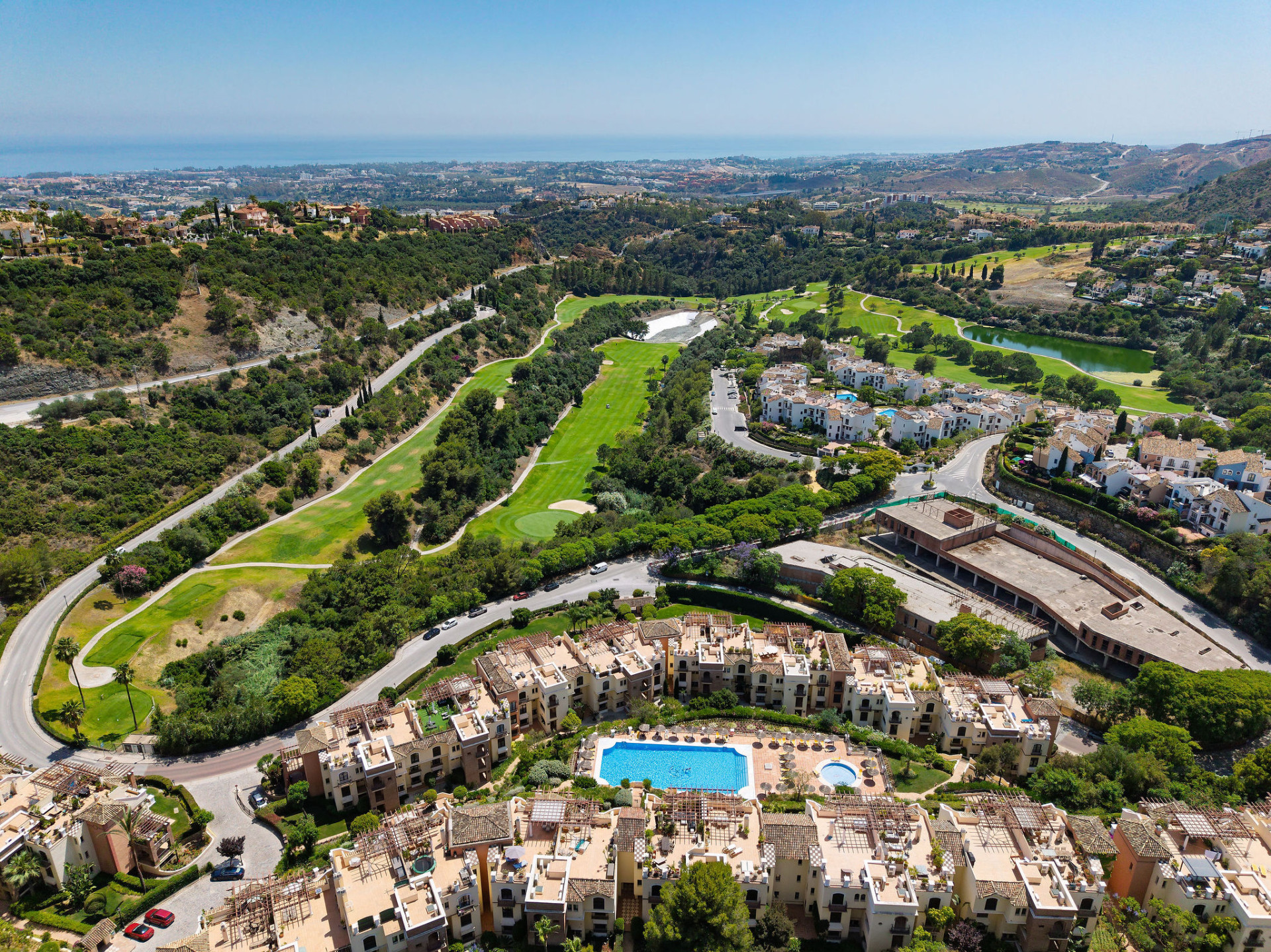Welcome to this beautifully renovated penthouse offering bright, contemporary living in a tranquil Andalusian urbanization! · Photo 37